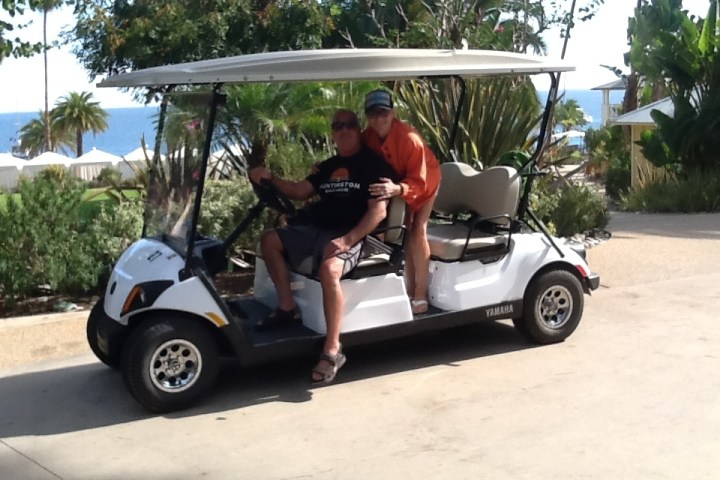 a man riding on the back of a truck